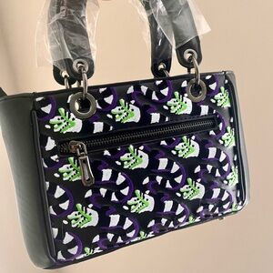 Our Universe Beetlejuice Sandworm All Over Print Glot in the dark Crossbody